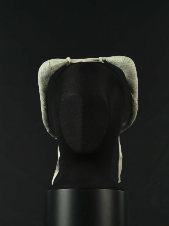 Podložka k ženskému účesu